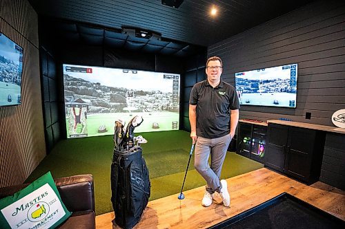 MIKAELA MACKENZIE / FREE PRESS
Lucas Mlinar, founder of Golf Haven (a new business that builds golf simulator sheds and does commercial golf simulator installations), in an example build on Wednesday, Dec. 31, 2025.
For Aaron story.
Free Press 2025