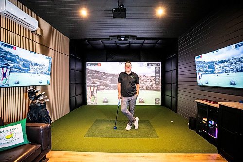 MIKAELA MACKENZIE / FREE PRESS
Lucas Mlinar, founder of Golf Haven (a new business that builds golf simulator sheds and does commercial golf simulator installations), in an example build on Wednesday, Dec. 31, 2025.
For Aaron story.
Free Press 2025