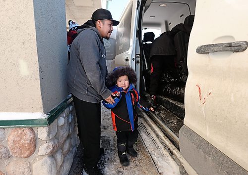 Ruth Bonneville / Free Press
Local - FIRST NATION POWER OUTAGE
Members of the Ross family from Cross Lake First Nation have move from the Best Western Plus to the Travel Lodge on New Year’s Eve Day after being evacuated from their community due to a power-outage.
Manitoba Hydro has estimated that power will be restored at 6 p.m. on Jan. 1st but there are reports of frozen water pipes that will need to be fixed before residents can return home.
Names of members of the Ross family entering the transport van.
Jack Ross (grey (hoodie) waits with his nephew Jasper Ross (3yrs) to get into the transport van as the entire Ross family move to the Travelodge Wednesday.
See story by Scott
Dec 31st,  2025