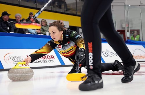 Kelsey Calvert of Team Beth Peterson throws a stone during Group play at the RME Women of the Rings in Rivers on Friday. The team was 4-0 entering the Friday evening draw against Kate Cameron. (Tim Smith/The Brandon Sun)