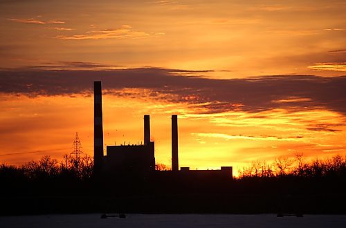 The Manitoba Hydro Brandon generating station off Victoria Avenue East is silhouetted against a colourful sky just before sunrise on the second day of 2026. (Matt Goerzen/The Brandon Sun)