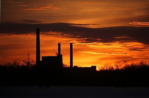 The Manitoba Hydro Brandon generating station off Victoria Avenue East is silhouetted against a colourful sky just before sunrise on the second day of 2026. (Matt Goerzen/The Brandon Sun)