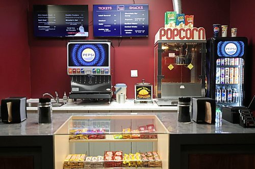 Ruth Bonneville / Free Press
BIZ - Flicks Cinema STONEWALL
Photo of the newly renovated concession area of Flicks Cinema First St. East in Stonewall.
Photograph of Vince Levenec (left), Amanda Van Solkema and Griffin Levenec, the three new owners of the Flicks Cinema, the movie theatre in Stonewall. The article focuses on why they decided to buy the business and what it's like running an independent movie theatre.
See story by Aaron
Jan 2nd,  2026