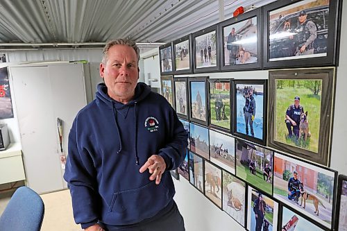 Jay Palmer, K9 program co-ordinator for the Province of Manitoba, stands in his office at the pratical training site of the Manitoba Emergency Services College. Palmer's wall is adorned with photos of dogs and handlers he's helped train for service in various professions over 25 years. (Connor McDowell/The Brandon Sun)