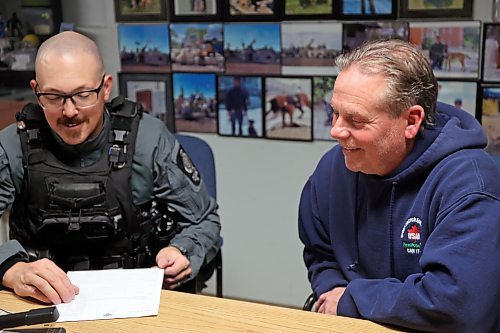 Brandon Police Service K9 handler Justin Artibise and his coach Jay Palmer of the Province of Manitoba in January. Artibise said he looks to Palmer for advice about anything and everything that comes up with his K9 dogs Aries and Blink. Palmer said those calls are one of the satisfying parts about teaching handlers and dogs to work in service. (Connor McDowell/The Brandon Sun)