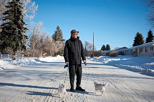 07012026
Darren More while walking his dogs Saffy and Trix near his home in Virden on Wednesday. Virden is under a Water Quality Advisory with levels of arsenic exceeding the acceptable levels for drinking water.
(Tim Smith/The Brandon Sun)