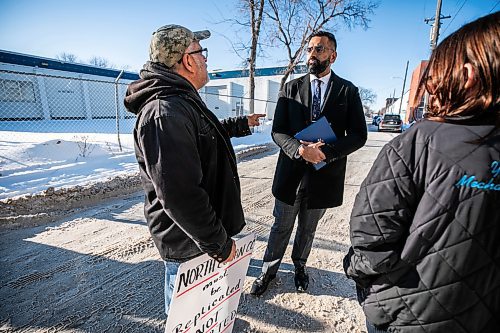 MIKAELA MACKENZIE / FREE PRESS

PC leader Obby Khan chats with community members Romeo Zapata (left) and Laurie Richardson before speaking to the media, opposing the proposed supervised consumption site, outside of 366 Henry Avenue on Thursday, Jan. 8, 2026.

For Chris story.
Free Press 2026
