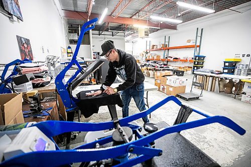 MIKAELA MACKENZIE / FREE PRESS

Darian Boubard works on putting orders together at Red Rebel Armour on Friday, Jan. 9, 2026.

For Aaron story.
Free Press 2026