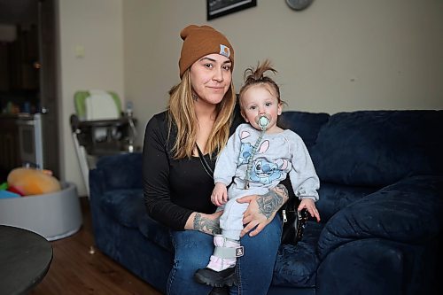 Katlin Taylor and her one-year-old daughter Brooklyn at their home in Brandon on Friday. Taylor alleges staff at the Brandon Regional Health Centre did not properly monitor her daughter when she took her to the hospital for respiratory syncytial virus (RSV). (Tim Smith/The Brandon Sun)