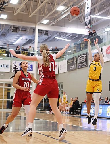 Brandon's Macaya Copeland (0) leaps to get a shot off. (Tim Smith/The Brandon Sun)