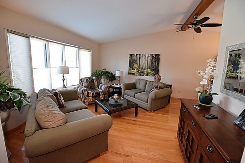 Todd Lewys / Free Press 
The home’s main living area gets off to a great start with a bright, roomy living room set beneath a gorgeous vaulted/beamed ceiling.