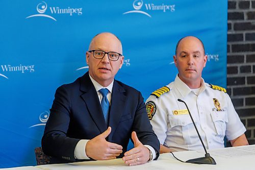 MIKE DEAL / FREE PRESS
Mayor Scott Gillingham and Christian Schmidt, Chief, Winnipeg Fire Paramedic Service along with other city officials hold a press conference at City Hall addressing the fire at the old Manwin Hotel at 655 Main Street.
Reporter: Scott Billeck and Tyler Searle
260114 - Wednesday, January 14, 2026.