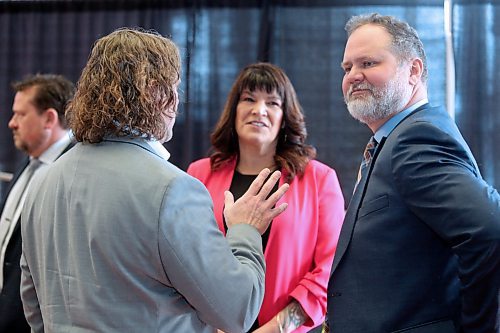 Brandon Mayor Jeff Fawcett, left, speaks with housing, Addictions and homelessness Minister Bernadette Smith and Justice Minister Matt Wiebe following a press conference in the foyer of Brandon City Hall on Friday morning. (Matt Goerzen/The Brandon Sun)
