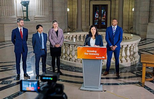 MIKE DEAL / FREE PRESS
Northern and Arctic Affairs Minister and Minister responsible for the Canadian Northern Economic Development Agency, Rebecca Chartrand (speaking) and Business, Mining, Trade and Job Creation Minister Jamie Moses (right) were joined by Chris Avery (group centre), president and CEO, Arctic Gateway Group, Carly Edmundson (group right), president and CEO, CentrePort Canada Inc., and Nick Hays (group left), president and CEO, Winnipeg Airports Authority, in the rotunda of the Manitoba Legislative Building to announce a new Manitoba trade alliance and sign a memorandum of understanding, Monday morning.
Reporter: Gabrielle Piche
260119 - Monday, January 19, 2026.