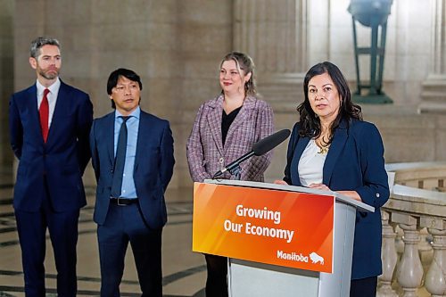 MIKE DEAL / FREE PRESS
Northern and Arctic Affairs Minister and Minister responsible for the Canadian Northern Economic Development Agency, Rebecca Chartrand (speaking) and Business, Mining, Trade and Job Creation Minister Jamie Moses (not pictured) were joined by Chris Avery (background centre), president and CEO, Arctic Gateway Group, Carly Edmundson (background right), president and CEO, CentrePort Canada Inc., and Nick Hays (background left), president and CEO, Winnipeg Airports Authority, in the rotunda of the Manitoba Legislative Building to announce a new Manitoba trade alliance and sign a memorandum of understanding, Monday morning.
Reporter: Gabrielle Piche
260119 - Monday, January 19, 2026.