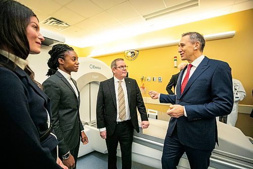 MIKAELA MACKENZIE / FREE PRESS
Dr. Anthony Kaufmann, neurosurgeon (right), talks with Katie Hall Hursh, board chair (left), Uzoma Asagwara, health minister, and Jonathon Lyon, HSC Foundation president and CEO, at the unveiling of a newer Gamma Knife brain surgery unit at the Health Sciences Centre on Monday, Jan. 19, 2026.
For Maggie story.
Free Press 2026