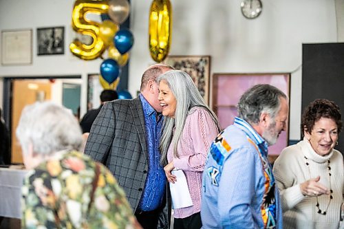 MIKAELA MACKENZIE / FREE PRESS

Patty Mainville embraces Larry McIntosh at Rossbrook Houseճ 50th anniversary birthday luncheon on Tuesday, Jan. 20, 2026.

For John story.
Free Press 2026