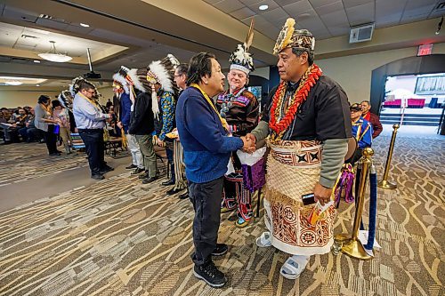 MIKE DEAL / FREE PRESS
Fred Harper, Elijah Harper brother, shakes hands with Chief Tuifa’asisina Vaeluaga Eli who is from the Royal Family of Samoa a Polynesian Nation in the South Pacific, after making a speech.
Chiefs arrive for the Roll Call of the Nations to kick off the start of the 30th anniversary of the Sacred Assembly which is being held at the Canad Inns Destination Centre Polo Park January 23-25.
In 1995, Elijah Harper organized a national Sacred Assembly in Hull, Quebec. It had a focus on spiritual reconciliation, healing, and justice between First Nations, Inuit, Métis and non-Indigenous peoples. It brought together 3,000 people from across Canadian society--Indigenous leaders, elders, youth, and community representatives, spiritual leaders from various faith traditions and political leaders at federal, provincial, and municipal levels. One of the most tangible outcomes associated with the Sacred Assembly was the momentum it helped generate for National Aboriginal Day (June 21). 
260123 - Friday, January 23, 2026.