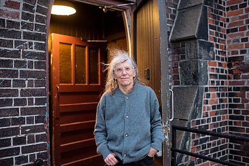 Poet, novelist and Reverend of Church of Saint Stephen-in-the-Fields, Maggie Helwig, poses for a portrait outside the church in Toronto, Ontario on January 13, 2026. (Photo by Marta Iwanek for The Winnipeg Free Press)
