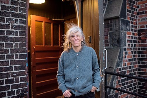Poet, novelist and Reverend of Church of Saint Stephen-in-the-Fields, Maggie Helwig, poses for a portrait outside the church in Toronto, Ontario on January 13, 2026. (Photo by Marta Iwanek for The Winnipeg Free Press)