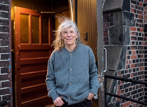 Poet, novelist and Reverend of Church of Saint Stephen-in-the-Fields, Maggie Helwig, poses for a portrait outside the church in Toronto, Ontario on January 13, 2026. (Photo by Marta Iwanek for The Winnipeg Free Press)