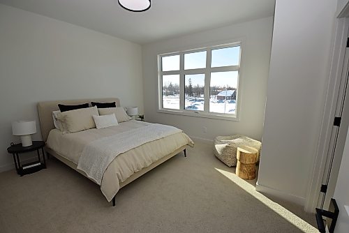 Todd Lewys / Free Press 
All three secondary bedrooms are big and bright, with one featuring its very own ensuite bathroom.