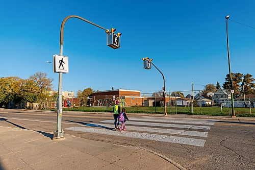 MIKE DEAL / FREE PRESS
Grade 2 student at River Elm School, Jaylyn Lagimodiere, crosses Talbot Avenue every morning during drop-off.
The stretch of Talbot Avenue including the intersection with Watt Street is one of the top 10 most ticketed school zones (30 km/h) in 2024-25.
Reporter: Maggie Macintosh
250925 - Thursday, September 25, 2025.