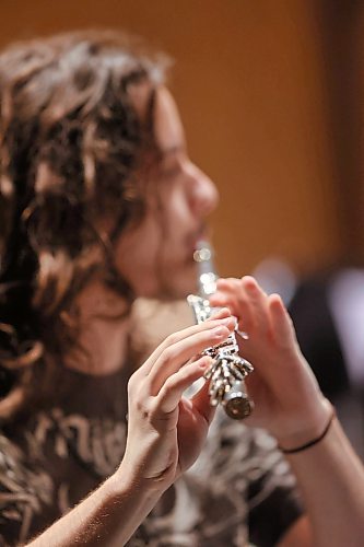 Light shines on the hands of a flutist during woodwind instrument practice on Friday morning. (Matt Goerzen/The Brandon Sun)