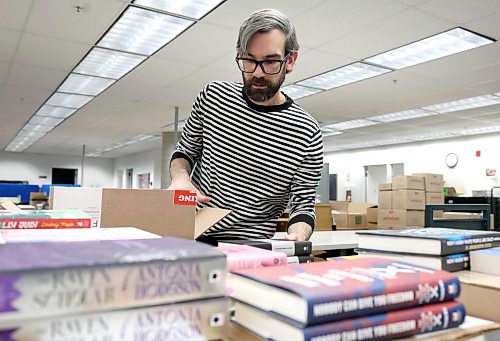Ruth Bonneville / Free Press 

ENT - BTS library

Place: Millennium Library

Photo of Corey Lefko, support services technician as he unpacks new books at the Millennium Library.  

Meeting up with  Aileen Clear, collections librarian for the city, for a Behind the Scenes feature on how the library procures books/ebooks/audiobooks and how it predicts popularity to meet demand 

Story by Eva Wasney

Feb 5th,  2026