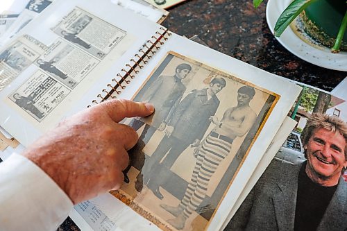 MIKE DEAL / FREE PRESS
Rod goes through a photo album that has some of his photos from when he was an Eatons model. Rod is on the left of the image.
Rod Peeler, who's been selling real estate in the city for 45 years. He's long been "Winnipeg-famous" for his "I never sleep" slogan, and for his mop of hair, reminiscent of Rod Stewart. 
Reporter: David Sanderson
260130 - Friday, January 30, 2026.