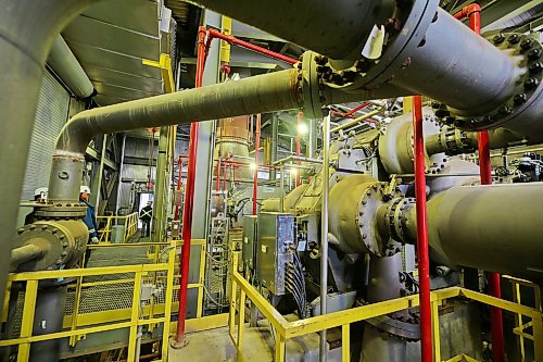 The air compressor building supports a 9,000 horsepower steam turbine. The turbine compresses air so that nitrogen can be delivered into fertilizer production. Hearing protection is mandatory in the building; the turbine is deafeningly loud. The steam-powered device was chosen for its efficiency. The turbine puts to use steam, a regular byproduct of other processes at the Koch plant, which sees constant heating and cooling. (Connor McDowell/The Brandon Sun)