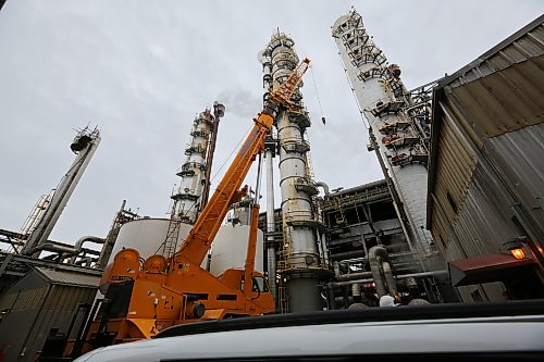 The middle of the three towers is the newest CO2 stripper tower at the Koch Fertilizer plant in Brandon. The tower was  driven into Brandon in the fall of 2025, and stands roughly 180 feet tall. It strips carbon dioxide from air so that the proper levels of nitrogen and hydrogen can be attained for fertilizer production. It took 12 days to move the tower from Edmonton to Brandon, due to having to travel at night, as well as through back roads to avoid congesting highways. (Connor McDowell/The Brandon Sun)