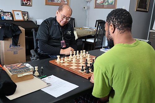 Gilbert Perez, a retired doctor originally from the Philippines, plays chess with Elisha Odinamadu in his house on Saturday afternoon. Perez will compete at the 25th IPCA World Individual Chess Championship in Torrevieja, Spain, from June 1 to 13, 2026. (Abiola Odutola/The Brandon Sun)