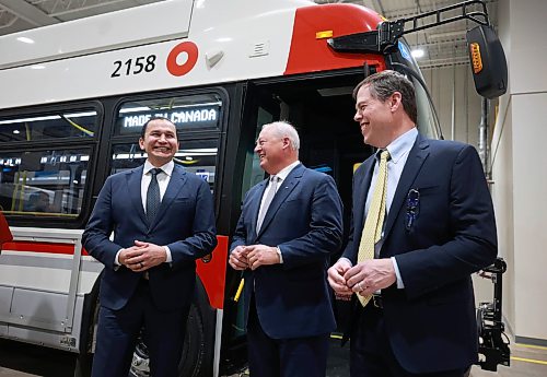 Ruth Bonneville / Free Press
BIZ/LOCAL - New Flyer
Premier Wab Kinew along with retiring New Flyer CEO, Paul Soubry and John Sapp, newly appointed president and CEO, NFI Group Inc. share some laughs after checking out one of New Flyer’s newest 2026, zero emissions, transit buses after press conference at New Flyer CAD facility Tuesday.
See story by Carol
March 3rd,, 2026