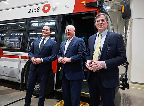 Ruth Bonneville / Free Press
BIZ/LOCAL - New Flyer
Premier Wab Kinew along with retiring New Flyer CEO, Paul Soubry and John Sapp, newly appointed president and CEO, NFI Group Inc. share some laughs after checking out one of New Flyer’s newest 2026, zero emissions, transit buses after press conference at New Flyer CAD facility Tuesday.
See story by Carol
March 3rd,, 2026