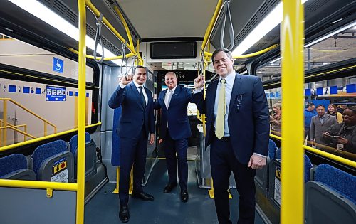 Ruth Bonneville / Free Press
BIZ/LOCAL - New Flyer
Premier Wab Kinew along with retiring New Flyer CEO, Paul Soubry and John Sapp, newly appointed president and CEO, NFI Group Inc. share some laughs as they check out one of New Flyer’s newest 2026, zero emissions, transit buses after press conference at New Flyer CAD facility Tuesday.
See story by Carol
March 3rd,, 2026