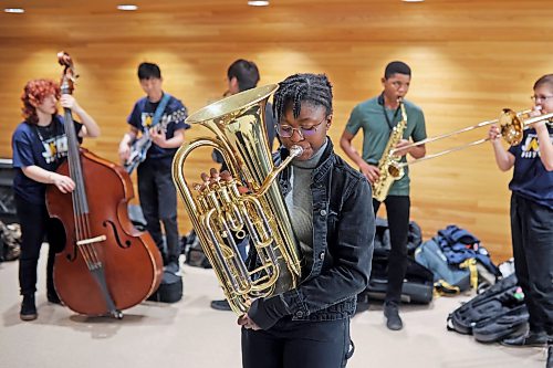 17032023
Members of Brandon’s Vincent Massey High School Junior Jazz Band warm up prior to performing during the Brandon University Jazz Festival at the Brandon University School of Music on Friday. The three day festival, the first since 2019 due to the COVID-19 pandemic, brought in school bands from across the province for performances and workshops throughout the WMCA and Brandon University. The festival wraps up today. 
(Tim Smith/The Brandon Sun)
