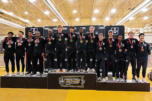 MATTHEW MERKEL / FREE PRESS
University of Manitoba Bisons' captured gold in the 4x200-metre men's relay on Saturday at the 2026 U Sports Track and Field Championships at the U of M's James Daly Fieldhouse. Podium: Bisons (gold), York Lions (silver), Western Mustangs (bronze). Gold medal podium from left: Bisons' Augustine Nkundimana, Noah Curtis, Tyrell Davis, Roy Tambal Musa, Gavin Moore.