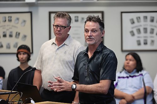 Former general manager of corporate services Cory Schermann explains the potential financial impacts of water affordability programs as former general manager of development services Mark Allard looks on at a Brandon City Council meeting in July 2024. (Colin Slark/The Brandon Sun files)
