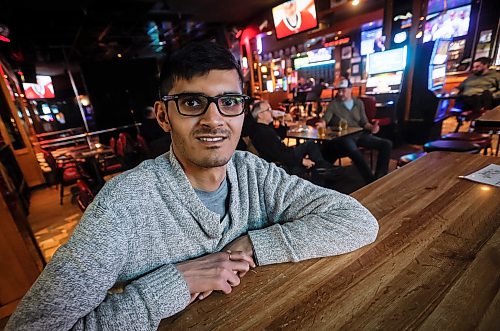 JOHN WOODS / FREE PRESS
Dev Oza, radio traffic host, and part time standup comedian performs a routine at an open stage at The Marion Tuesday, March 10, 2026.
reporter: dave