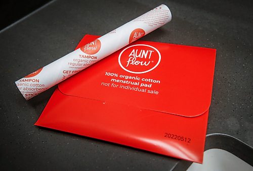 JOHN WOODS / WINNIPEG FREE PRESS
University of Winnipeg Student Association (UWSA) president Tomiris Kaliyeva, right, and Christine Quiah, VP of student affairs, are photographed with one of their menstrual pad, tampon and other menstrual product dispensers in a bathroom on campus Monday, December 11, 2023. The University of Winnipeg is the latest campus making pads, tampons and other menstrual products free of charge to students, staff and passersby.

Reporter: maggie