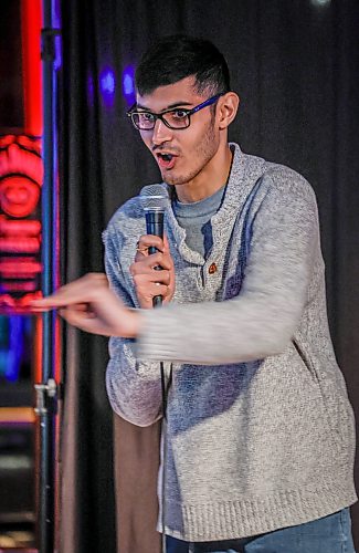 JOHN WOODS / FREE PRESS
Dev Oza, radio traffic host, and part time standup comedian performs a routine at an open stage at The Marion Tuesday, March 10, 2026. 

reporter: dave