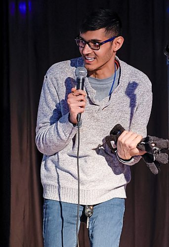 JOHN WOODS / FREE PRESS
Dev Oza, radio traffic host, and part time standup comedian performs a routine at an open stage at The Marion Tuesday, March 10, 2026. 

reporter: dave