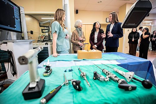 MIKAELA MACKENZIE / FREE PRESS
Instrument sales rep Sierra Slubowski (left), first surgery patient Carol Bigold, MLA Jelynn Dela Cruz and MLA Tracy Schmidt take a look at the new spinal surgery equipment at Concordia Hospital on Friday, March 13, 2026.
For Carol story.
Free Press 2026