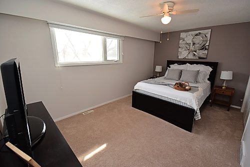 Todd Lewys / Free Press 
The spacious primary bedroom is a cosy retreat.