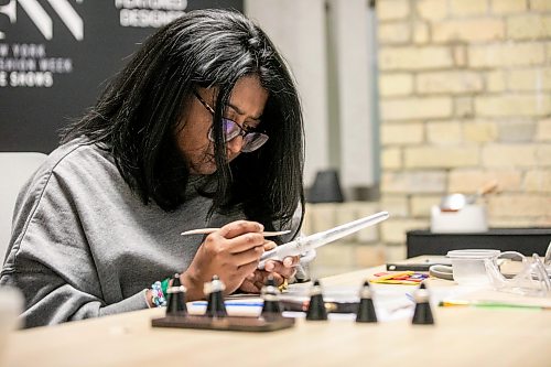 MIKAELA MACKENZIE / FREE PRESS

AV Kitching molds the ring on the mandrel during a silver ring-making workshop on Monday, March 23, 2026. 

For AV story
Free Press 2026