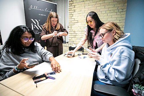 MIKAELA MACKENZIE / FREE PRESS
AV Kitching (left), Jillian Sheedy, Joanne Roberts, and Shae-Lynn Murray work on finessing and sanding the rings while still on the mandrel during a silver ring-making workshop on Monday, March 23, 2026.
For AV story
Free Press 2026