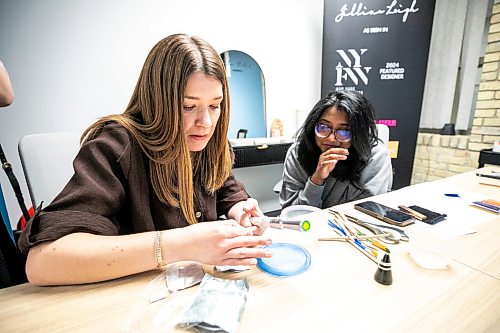 MIKAELA MACKENZIE / FREE PRESS
Jillian Sheedy (left) helps AV Kitching with some sanding during a silver ring-making workshop on Monday, March 23, 2026.
For AV story
Free Press 2026