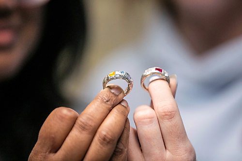 MIKAELA MACKENZIE / FREE PRESS

AV Kitching (left) and Shae-Lynn Murray shows off their finished products after taking a silver ring-making workshop on Monday, March 23, 2026. 

For AV story
Free Press 2026