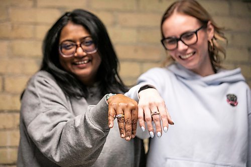 MIKAELA MACKENZIE / FREE PRESS
AV Kitching (left) and Shae-Lynn Murray shows off their finished products after taking a silver ring-making workshop on Monday, March 23, 2026.
For AV story
Free Press 2026